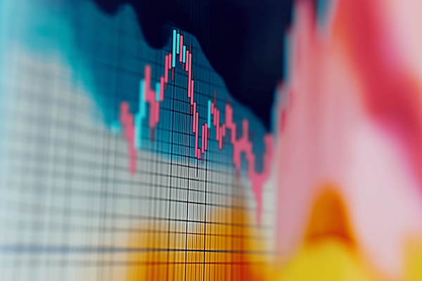 Stock market trading floor with financial data displays